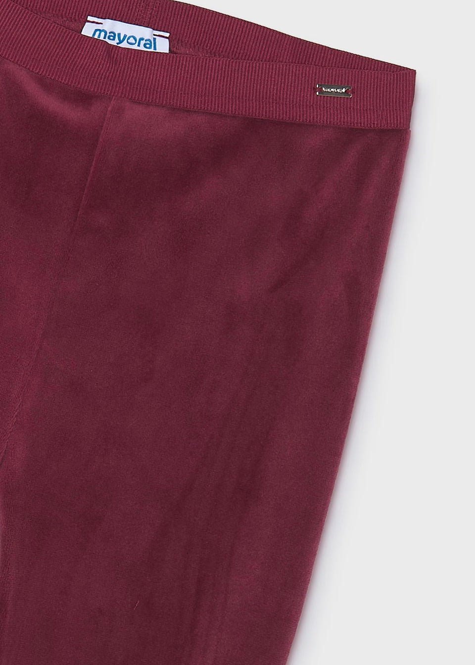 Maroon Little Girl Velvet Leggings with a stretchy elastic waistband and small metallic “Mayoral” brand tag. Ultra-soft velvet fabric. Available in sizes 2-9 years.