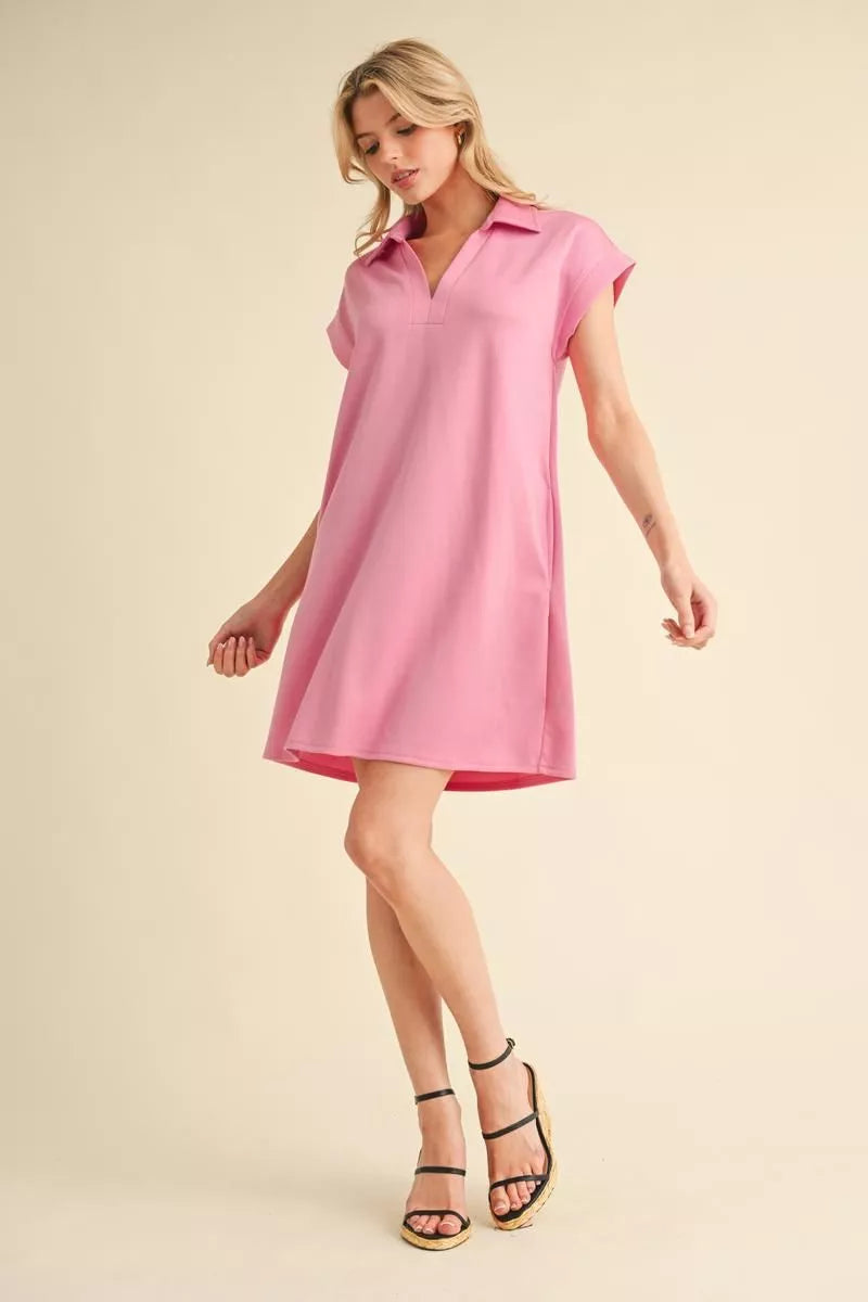 Pink Collared Short Sleeve Dress with loose fit and V-neck. Available in sizes XS-XL.