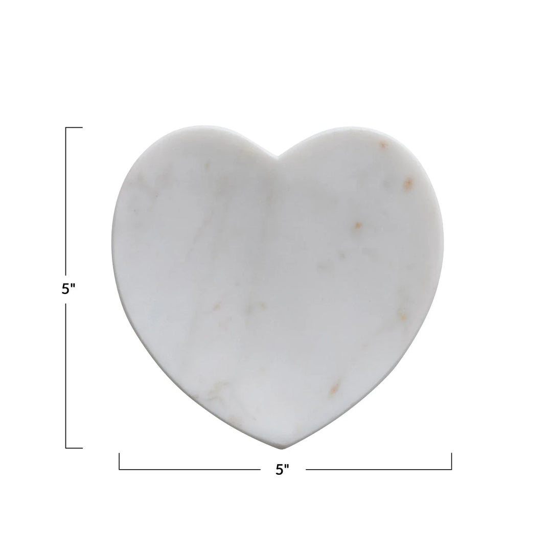 Heart-shaped white marble dish with subtle gray and brown veining, available in 5"x5" size.