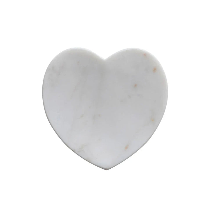 White marble heart-shaped dish with grey veins and small brown spots; available in multiple sizes.