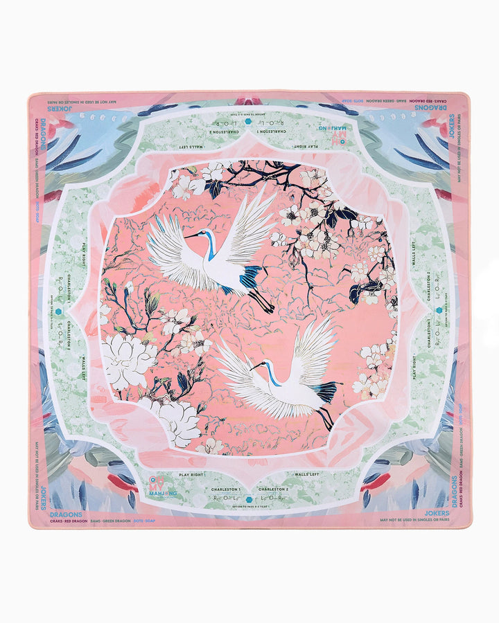 Square silk scarf with white herons, cherry blossoms, pink base, green-blue border. Available in multiple sizes.