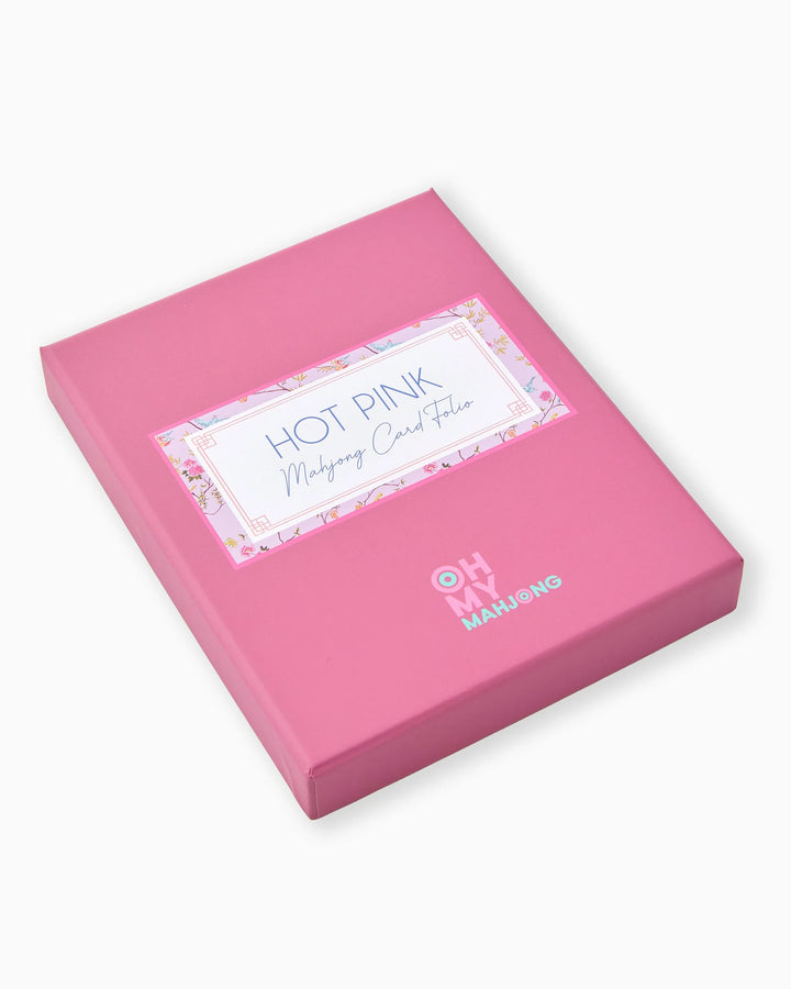 Hot pink card folio with "OH MY MAHJONG" logo, available in standard size; adds bold color to your mahjong setup.
