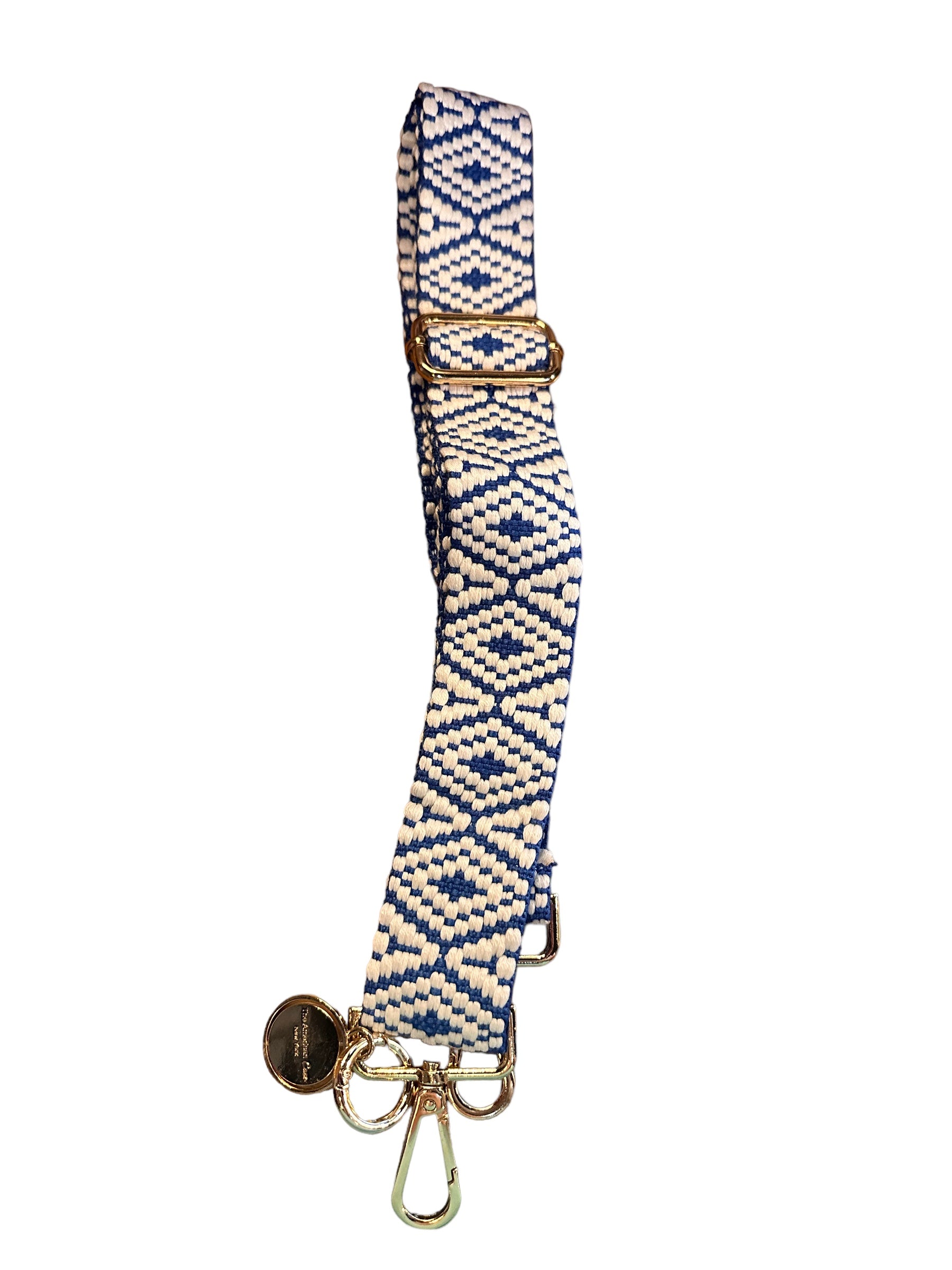 This product is a fabric dog leash in a blue and white pattern. It comes with gold-colored metal clasps, an adjustable crossbody phone strap, and a circular charm. The leash is available in various sizes to suit different dog breeds and sizes.