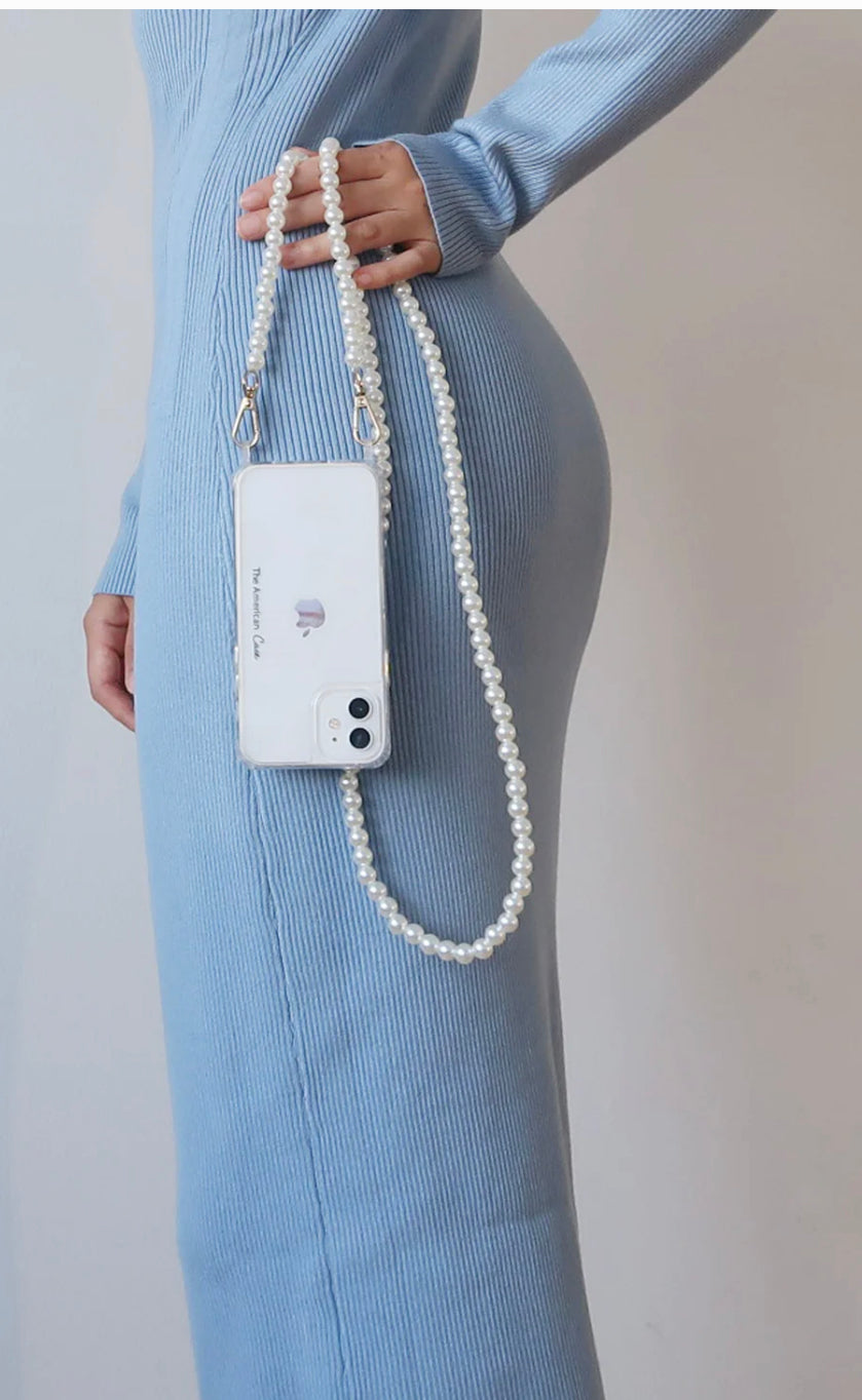 The product is an Adjustable Crossbody Phone Strap. It is a versatile accessory, convenient for carrying smartphones of various sizes. Its features include durability and adjustability allowing for comfortable wear across the body. The strap color showcased here is white. Can accommodate varying smartphone dimensions.