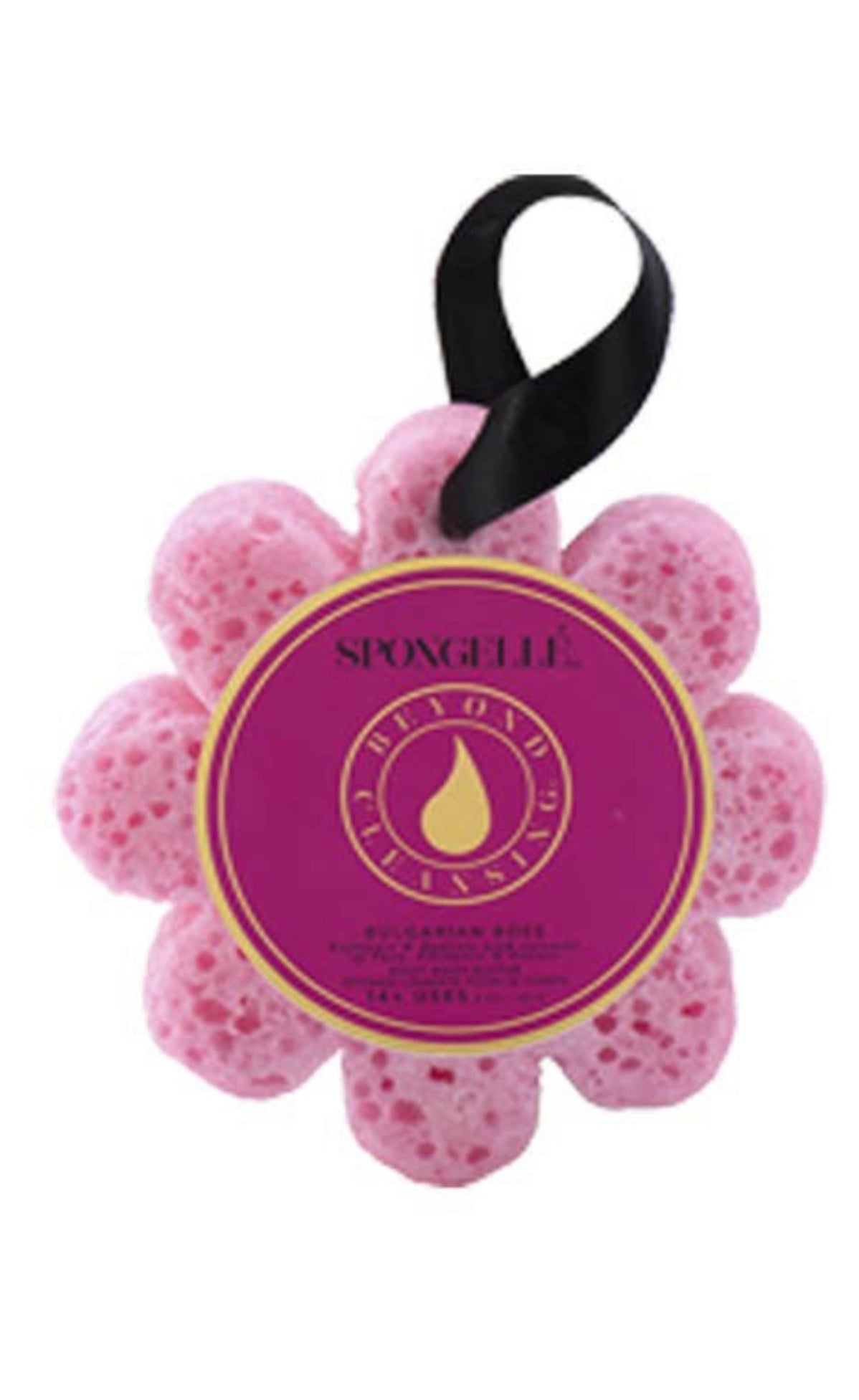 This product is a pink Spongelle Flowers body wash-infused buffer. It has a black ribbon hanger for easy storage and use. The buffer features a central circular label, prominently showcasing the "spongellé" brand name against a stark white background.