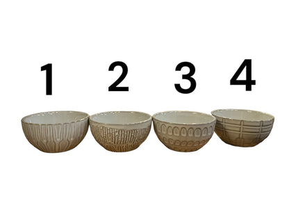 Set of four textured stoneware bowls, available in multiple sizes.