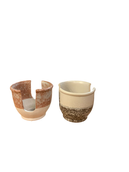 Reddish-brown stoneware sponge holder with two wide notches. Available in small and large sizes.