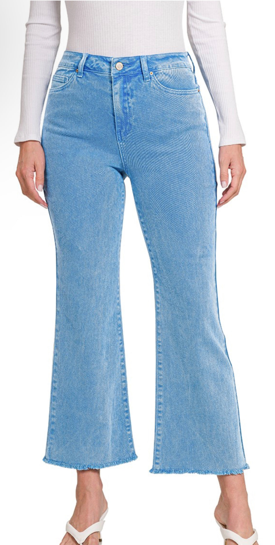 Acid wash high waisted frayed jeans are the feature product. They have a retro style, with a distinct faded blue color and frayed hems. Available sizes range from XS to XXL.