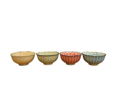 Set of four stoneware bowls in yellow, green, red, and blue with intricate patterns. Available in small and large sizes.