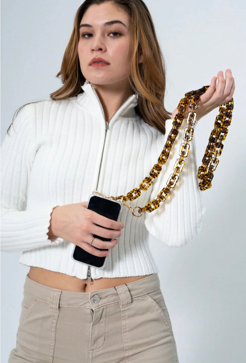 The Adjustable Crossbody Phone Strap is a practical and stylish accessory, ensuring your phone is safely secured while delivering a fashionable touch to your outfit. The strap features an adjustable length for optimal comfort and utility. It secures easily to most smartphone cases for convenience. Available in various colors to match any style preference.