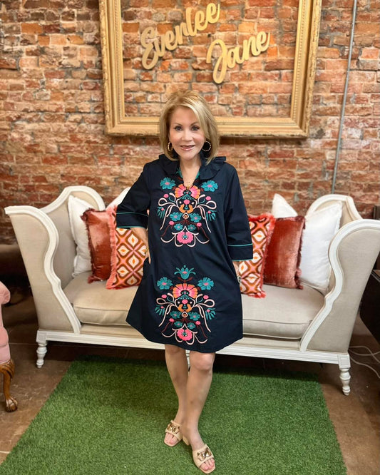 Cecilia Floral Embroidered Dress in navy with ruffle collar, available in sizes XS–XL.