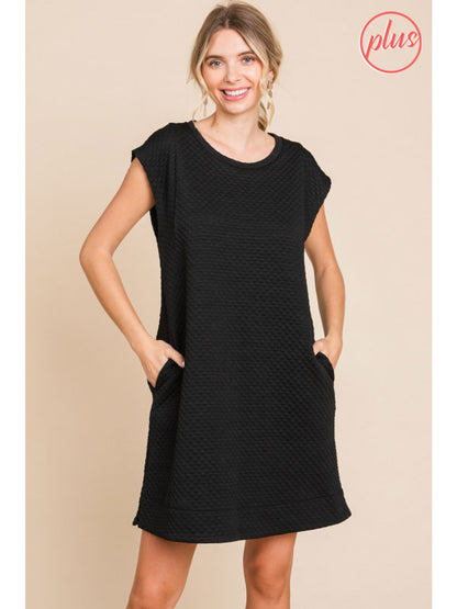 The Embossing Texture Dress with Pockets is a versatile wardrobe addition, characterised by a unique embossed texture. The dress features convenient pockets, adding both style and functionality. Available in plus sizes.