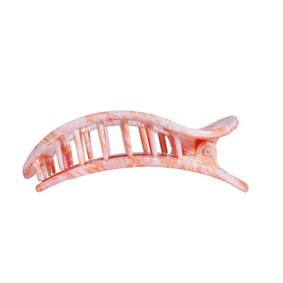 Large, curved marbled pink and white hair clip with interlocking teeth and hinged clasp. Available in one size.