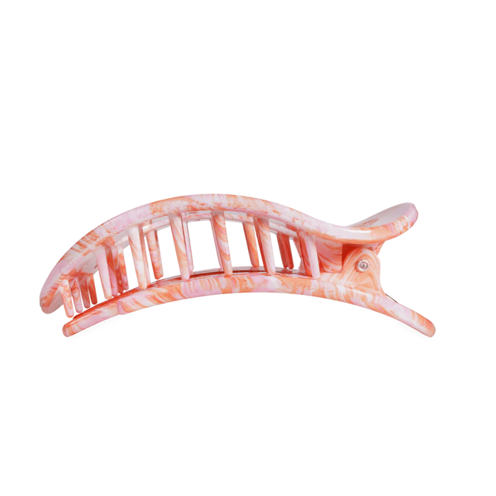 Large, curved marbled pink and white hair clip with interlocking teeth and hinged clasp. Available in one size.
