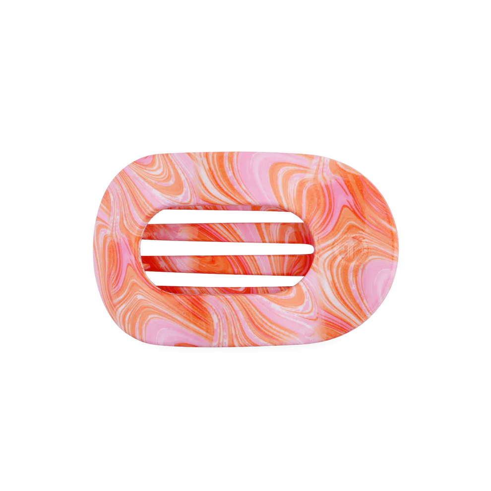 Oval soap dish with slotted center, marbled pink, orange, and white. Available in small and large sizes.