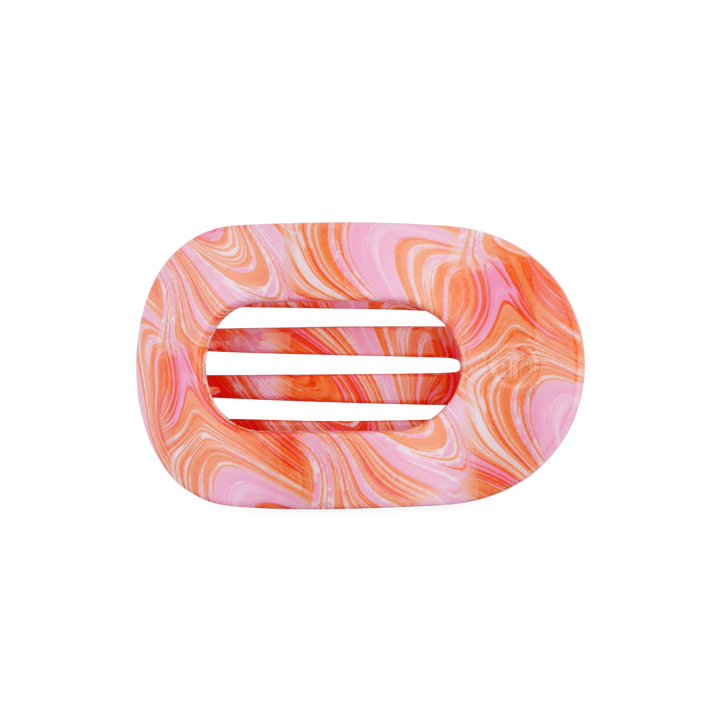Oval soap dish with slotted center, marbled pink, orange, and white. Available in small and large sizes.