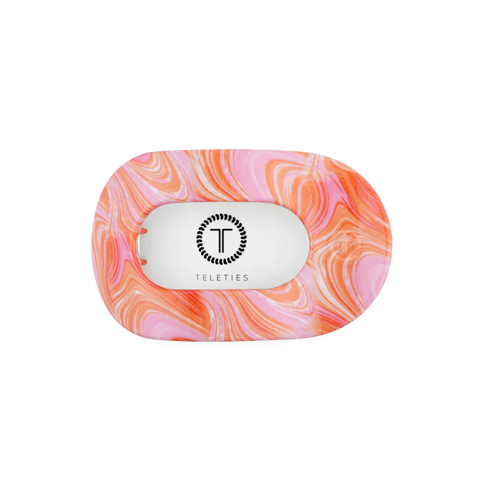 Flat Round Hair Clip, Summer Tie Dye Edition: durable, rounded edges, pink-orange marbled pattern. Available in multiple sizes.