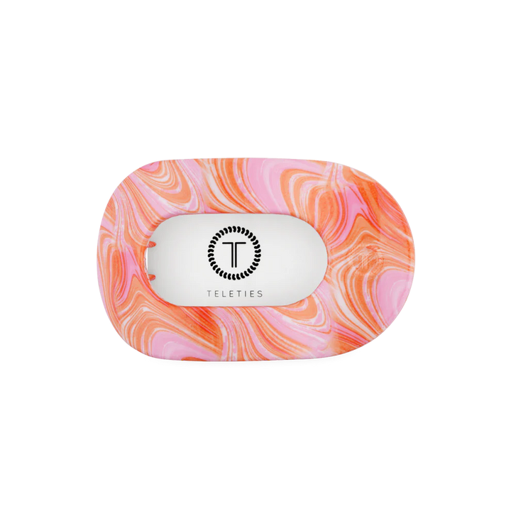 Flat Round Hair Clip, Summer Tie Dye Edition: durable, rounded edges, pink-orange marbled pattern. Available in multiple sizes.