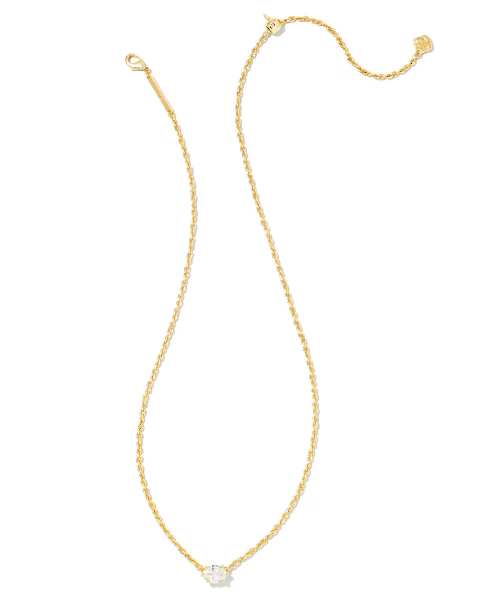 The Cailin Gold Pendant Necklace in White Crystal by Kendra Scott features a single clear white crystal pendant. Available in multiple sizes.