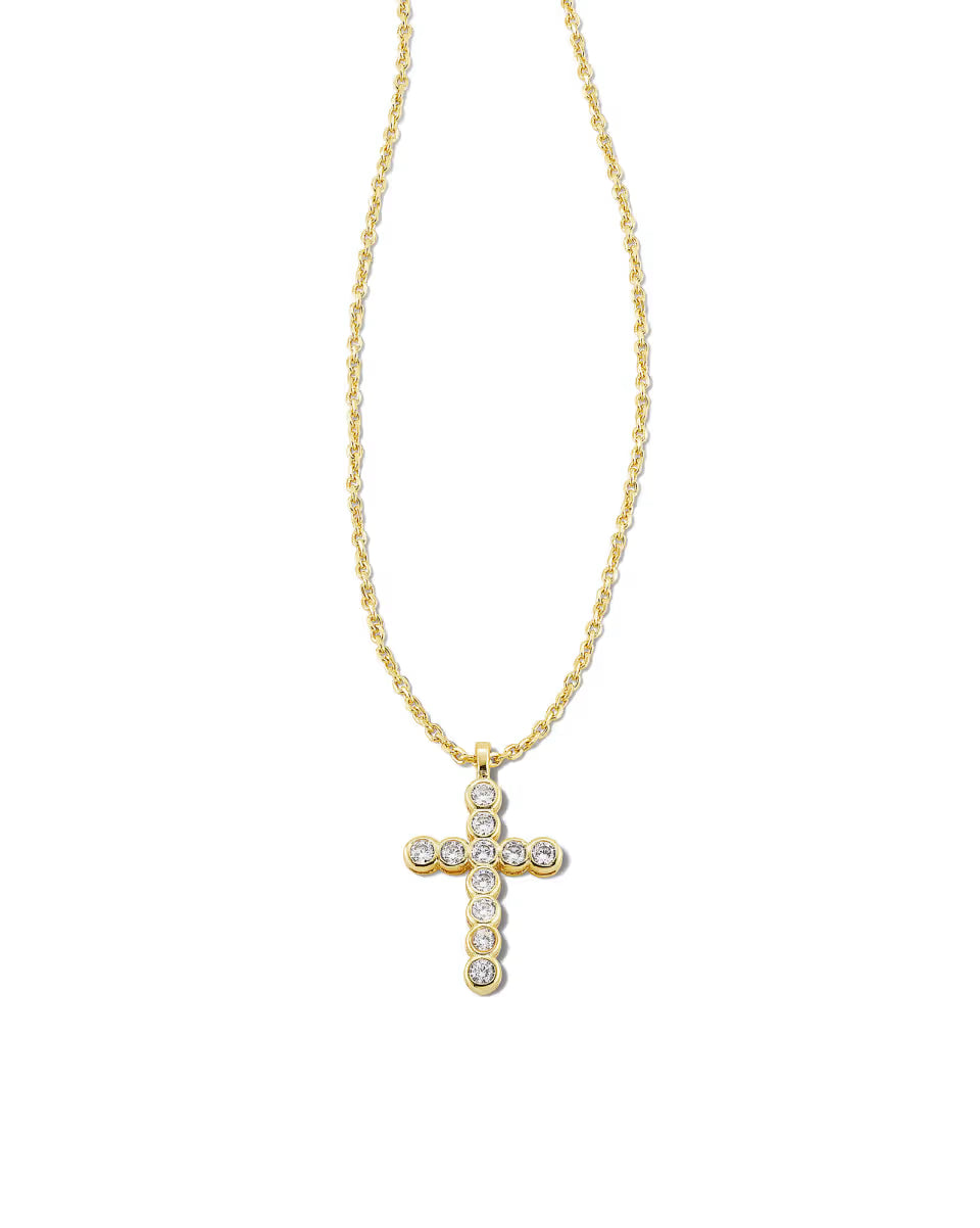 Cross Gold Pendant Necklace in White Crystal by Kendra Scott, featuring a gold chain and a cross-shaped pendant with white crystals. Available in multiple sizes.