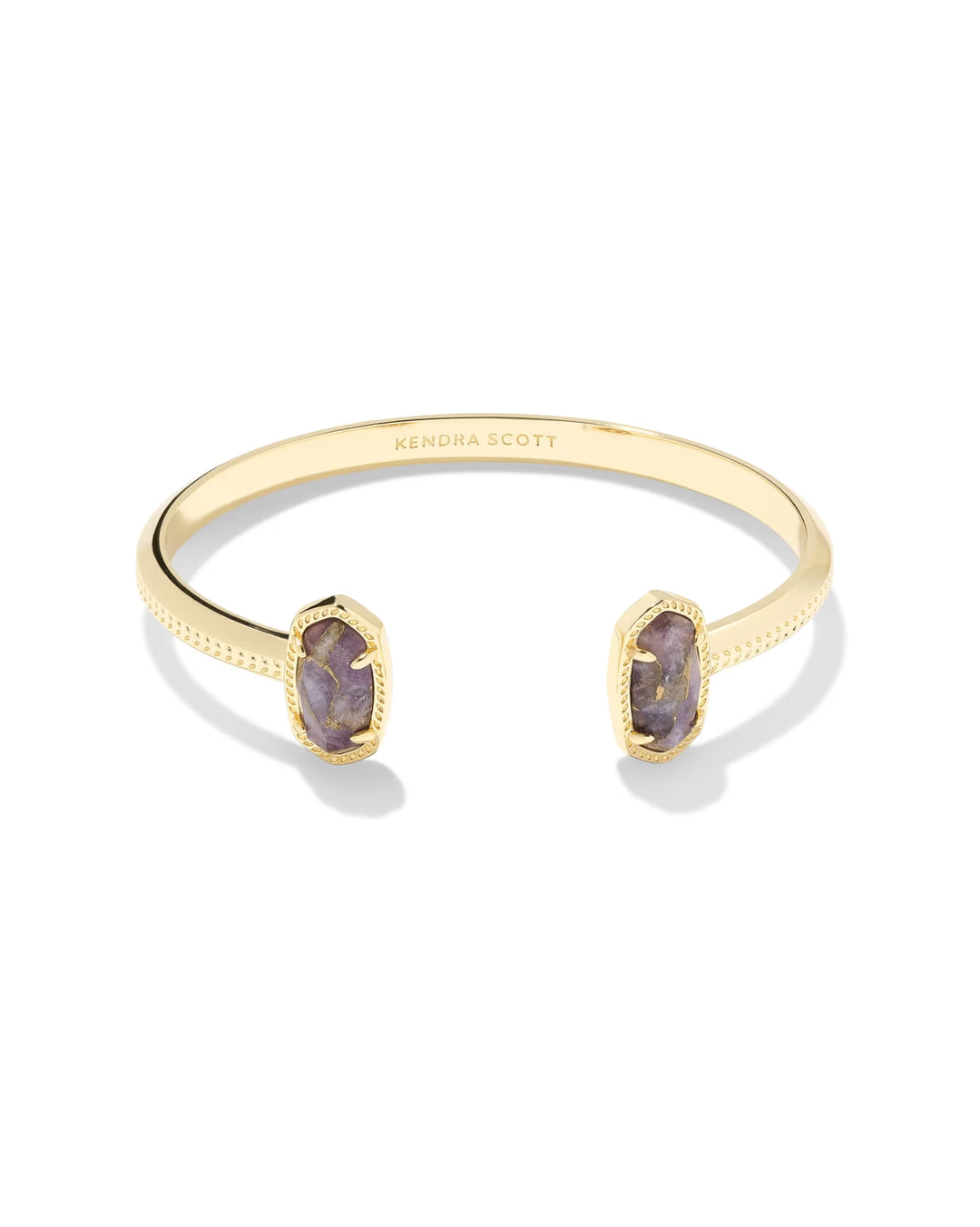 14k yellow gold Elton Gold Cuff Bracelet by Kendra Scott, with bronze veined purple amethyst ends, textured edges, open top, and “Kendra Scott” engraved inside. Sizes available: Small/Medium and Medium/Large.