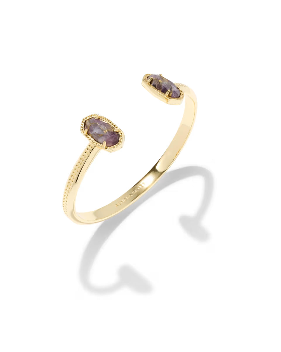 Bronze veined purple amethyst gemstones accent each end of the Elton Gold Cuff Bracelet in radiant 14k yellow gold. Available in small, medium, and large sizes.