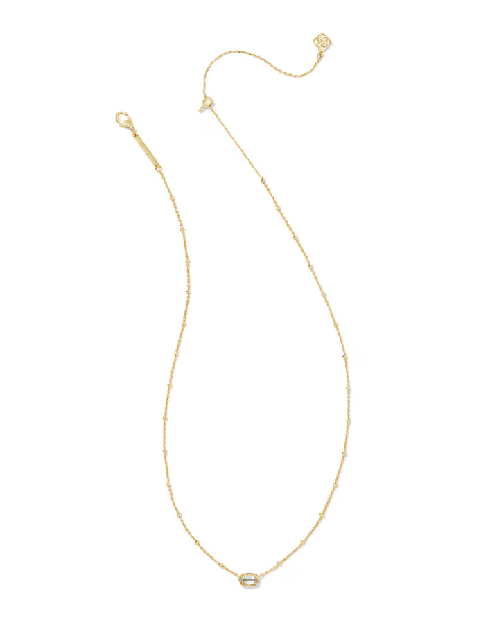 Mini Elisa Gold Satellite Short Pendant Necklace by Kendra Scott with a delicate gold chain, adjustable clasp, and small oval dichroic glass pendant. Available in one size.