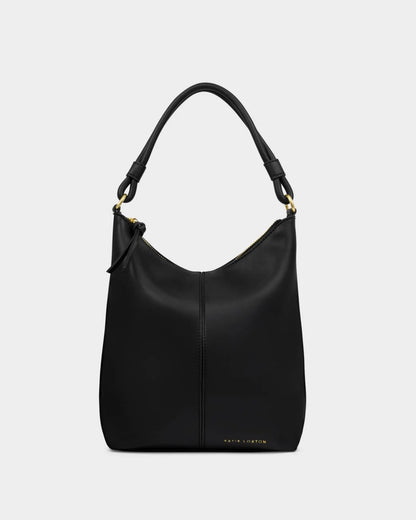 The Hallie Satchel Bag | Black features vegan leather, a single top handle, gold hardware, and a subtle brand logo near the base. Available in multiple sizes.