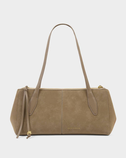 Taupe Hattie Suedette Shoulder Bag in waterproof suedette and vegan leather with long double straps, gold hardware, front seam detail, and subtle gold logo. Soft suede-like texture and minimalist design. Available in sizes small, medium, and large.