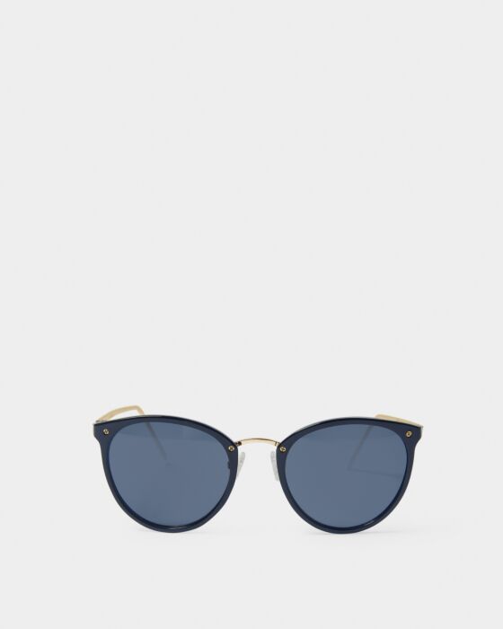 Santorini Sunglasses have round dark blue UV400 lenses, black frames, gold accents. Available in 4 colors and multiple sizes.
