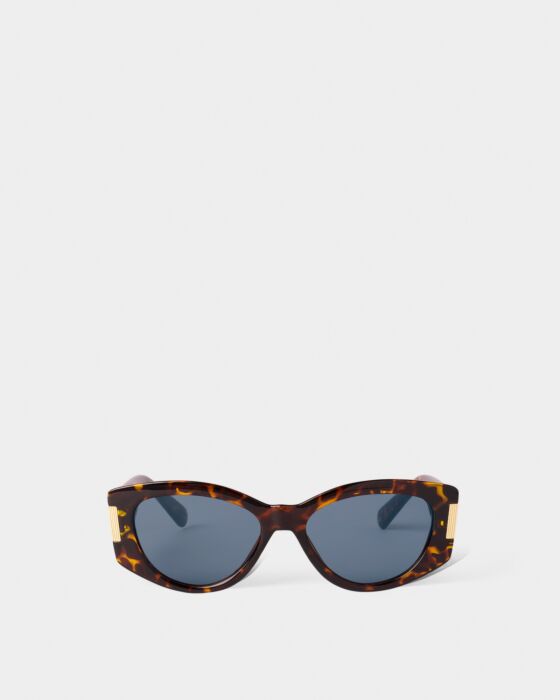 Rimini Cat-Eye Sunglasses in tortoiseshell, blue UV400 lenses, gold accents, recycled materials. Three colors. Sizes: S, M, L.