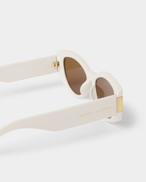 Rimini Cat-Eye Sunglasses: white frame, brown lenses, UV400, gold hinges, "KATIE LOXTON" on arm. Sizes available. 3 colors.