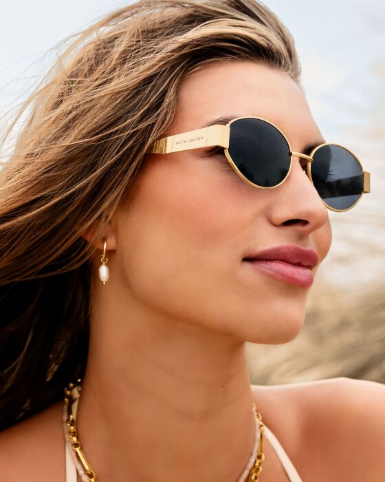 Siena Sunglasses with gold frames, UV400 protection, recycled materials. Sizes: S, M, L.