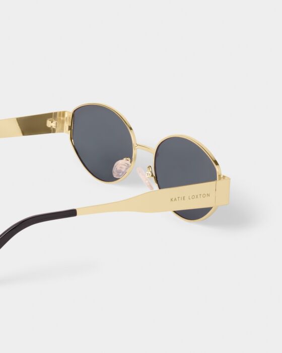 Siena Sunglasses: Gold round frame, dark UV400 lenses, "KATIE LOXTON" engraved. Available in one size.