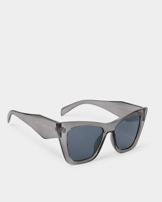 Gray cat-eye Porto Sunglasses with UV400 lenses, wide glossy arms, gold logo on temples. Made from recycled materials. Sizes: 2.