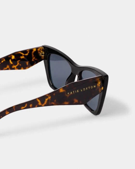 Porto Sunglasses in 2 colors, dark UV400 lenses, recycled materials, "KATIE LOXTON" on arm. Sizes available: standard.