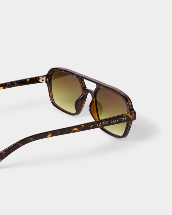 Ibiza Sunglasses: tortoiseshell aviators with gradient yellow lenses, UV400 protection, "KATIE LOXTON" on arm. Sizes: S, M, L.