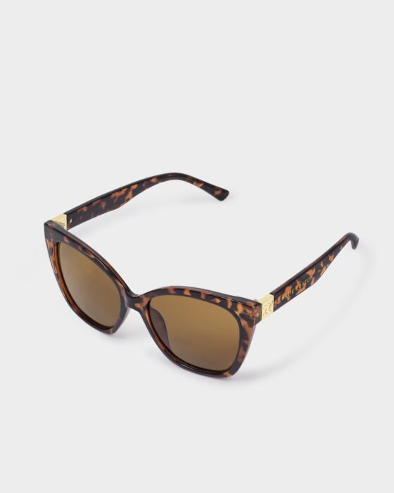Mykonos Oversized Cat-Eye Sunglasses with dark tortoiseshell frame, brown UV400 lenses, gold hinges. Sizes: S, M, L.