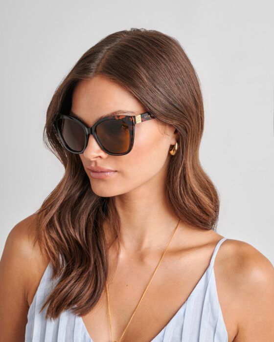 Mykonos Oversized Cat-Eye Sunglasses with UV400 protection; available in sizes S, M, L.