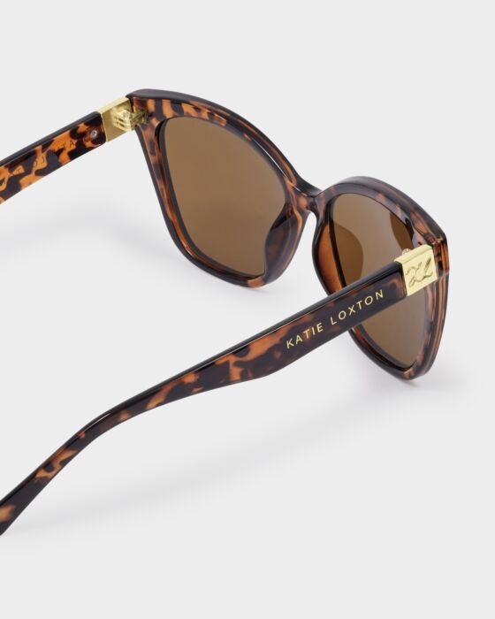 Mykonos Oversized Cat-Eye Sunglasses: dark tortoiseshell frame, brown UV400 lenses, gold arms. Sizes: one size.