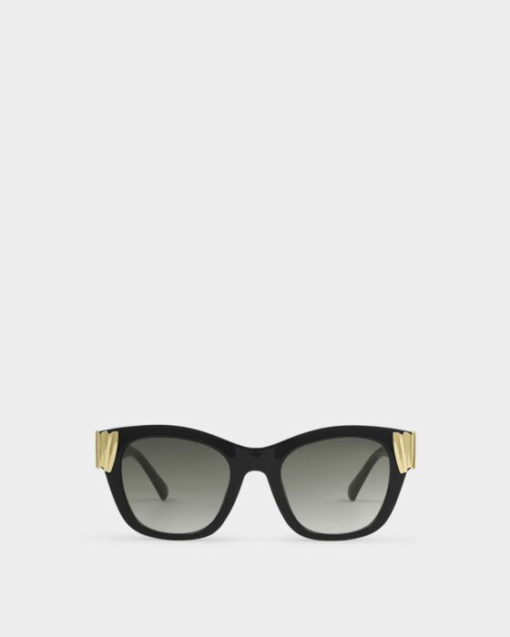 Seychelles Round Cat-Eye Sunglasses: black frames, dark gradient lenses, gold corners, UV400, recycled. Sizes: S/M/L.