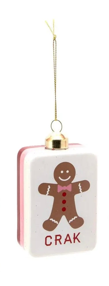 Rectangular gingerbread man mahjong tile ornament with “CRAK.”