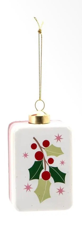 Square Mahjong Christmas ornament with holly and pink stars.
