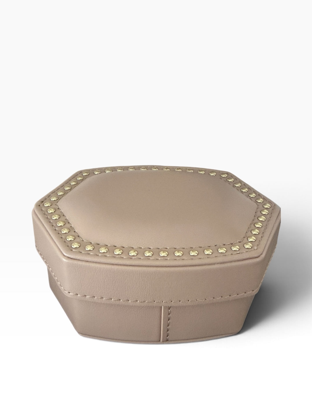 Kendra Scott Daphne Amelia Jewelry Box Set, a neutral hexagonal box with gold stud accents on the lid.