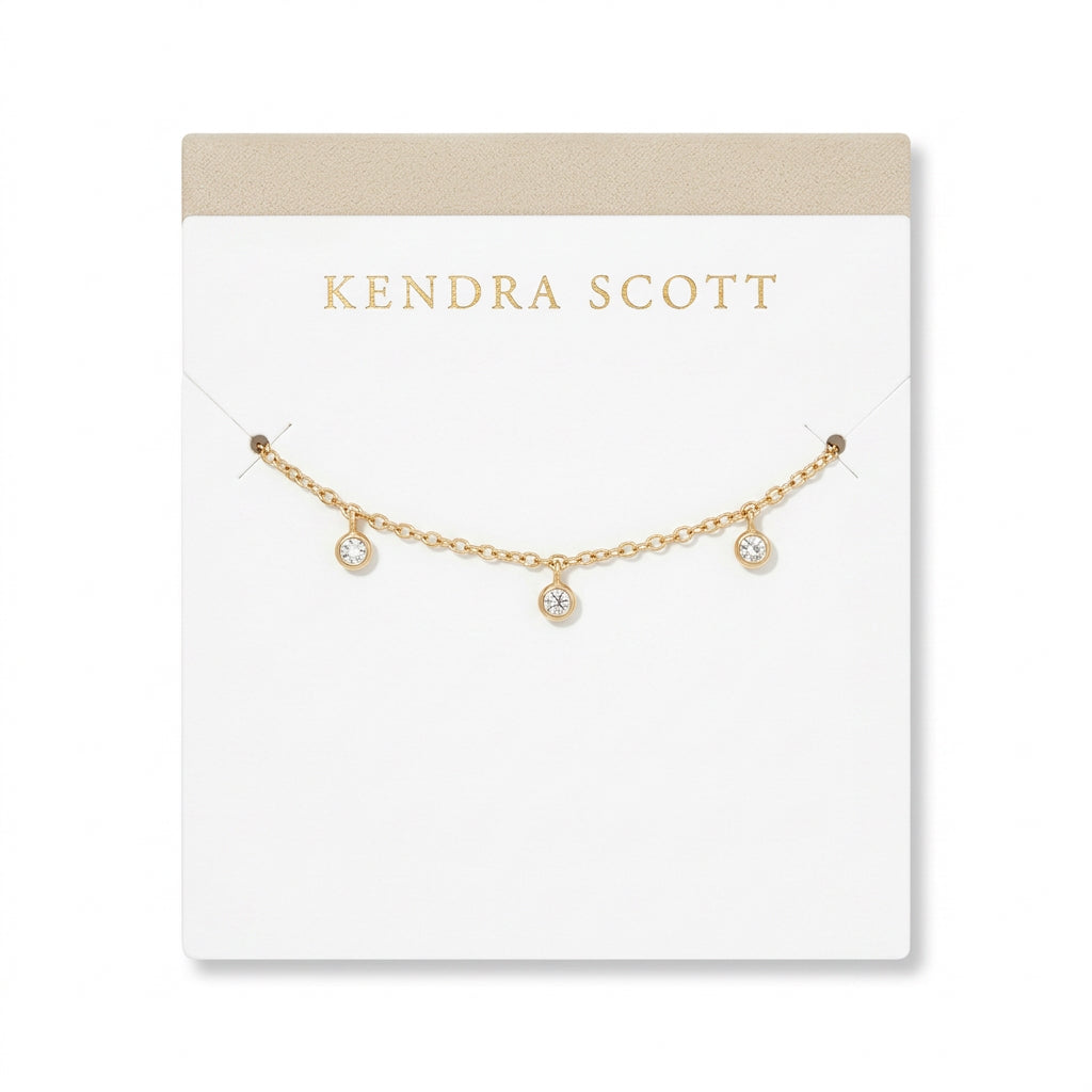 Kendra Scott Daphne Amelia Jewelry Box Set, two gold-tone chain necklaces with round bezel-set crystals.