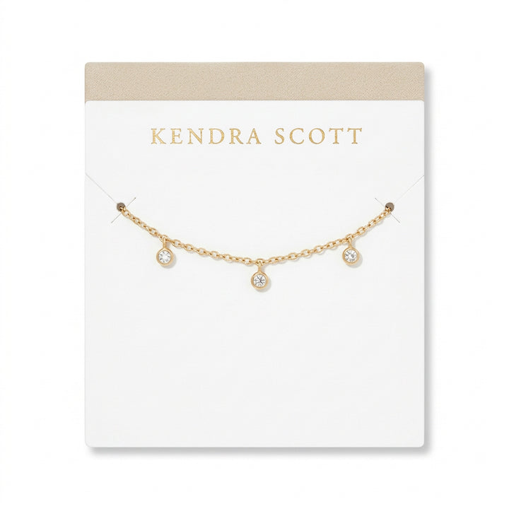 Kendra Scott Daphne Amelia Jewelry Box Set, two gold-tone chain necklaces with round bezel-set crystals.