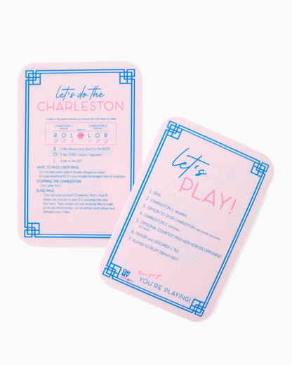 Pastel pink card with blue and pink borders displaying Charleston dance steps. Available sizes: standard and mini.