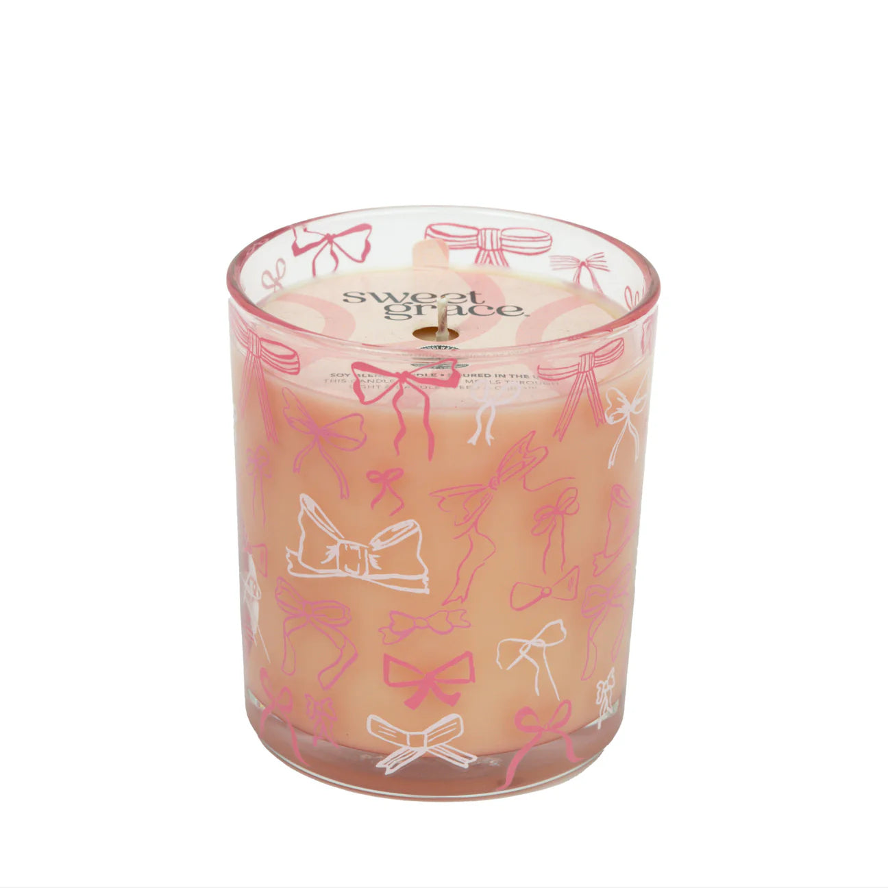 Pink Bow Candle #072: peach glass, pink bow, visible wick, soy-blend wax, "Sweet Grace" logo. Sizes: not specified.