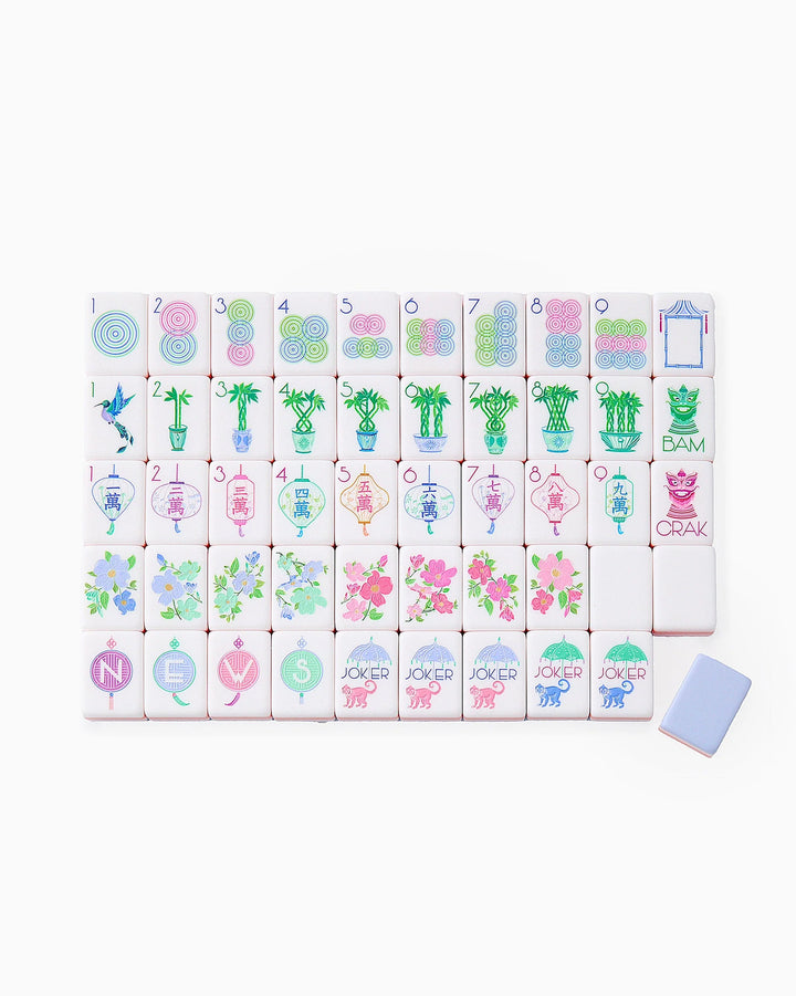 Elegant Luminaire Mahjong Tiles in rows display suits and jokers; available sizes: standard, large. One tile is face down.