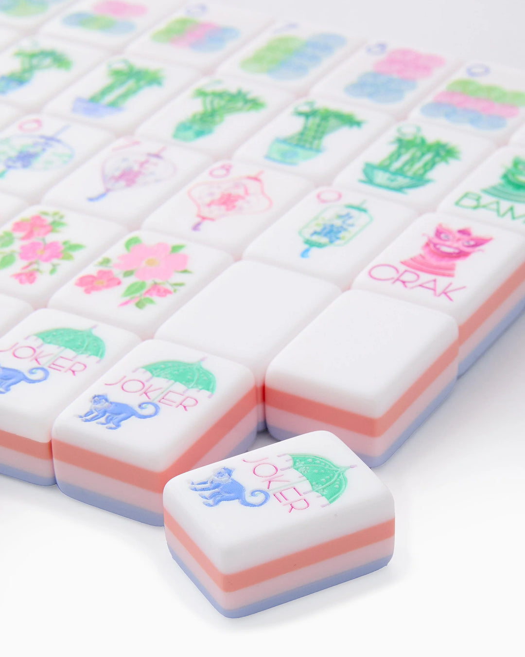 Luminaire Mahjong Tiles: pastel designs, pink/blue edges. Designs include flowers, cats, plants, “JOKER.” Sizes available.